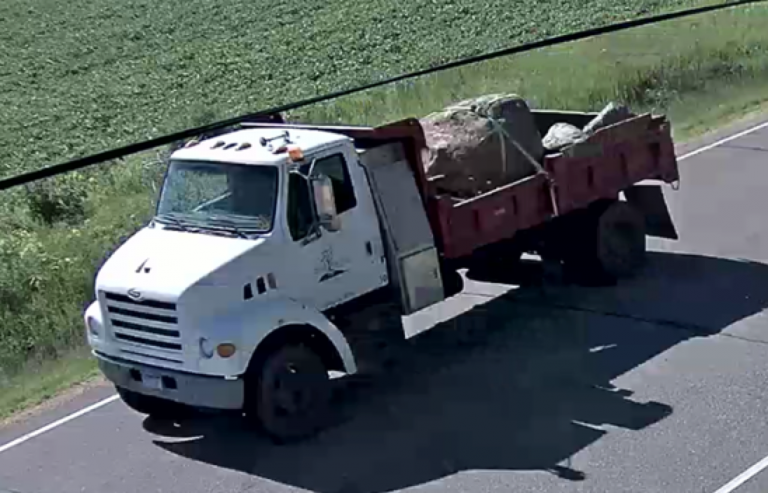 Landscaping truck with boulders in the back