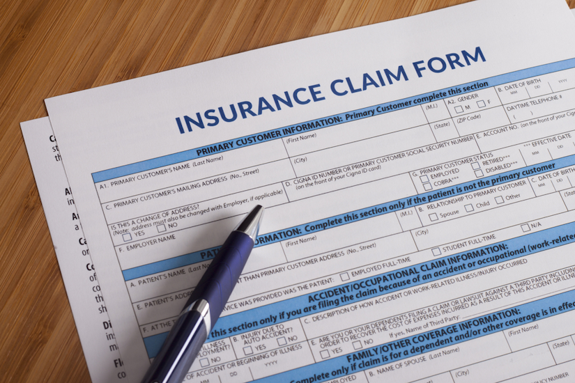 blank insurance form with pen on the table